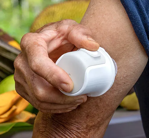 Dexcom user attaching the Dexcom G7