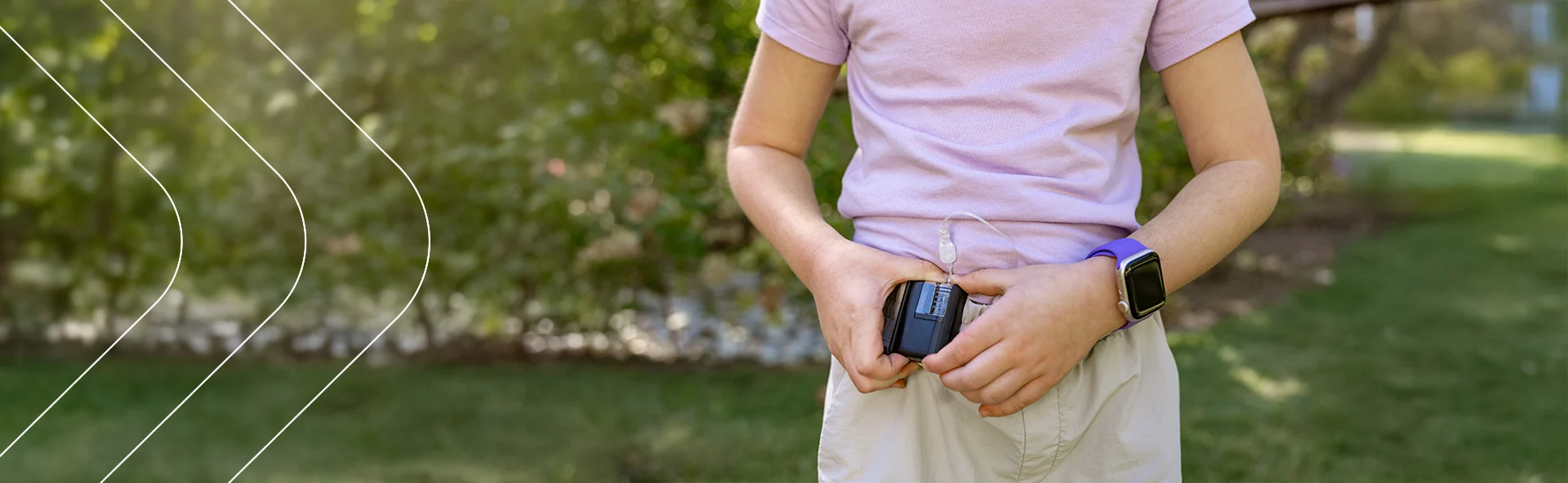 Child holding their Tandem Mobi pump