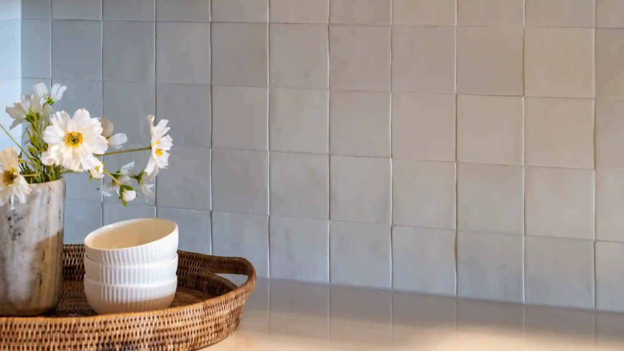 White zellige tile in 4x4 square kitchenette backsplash. 