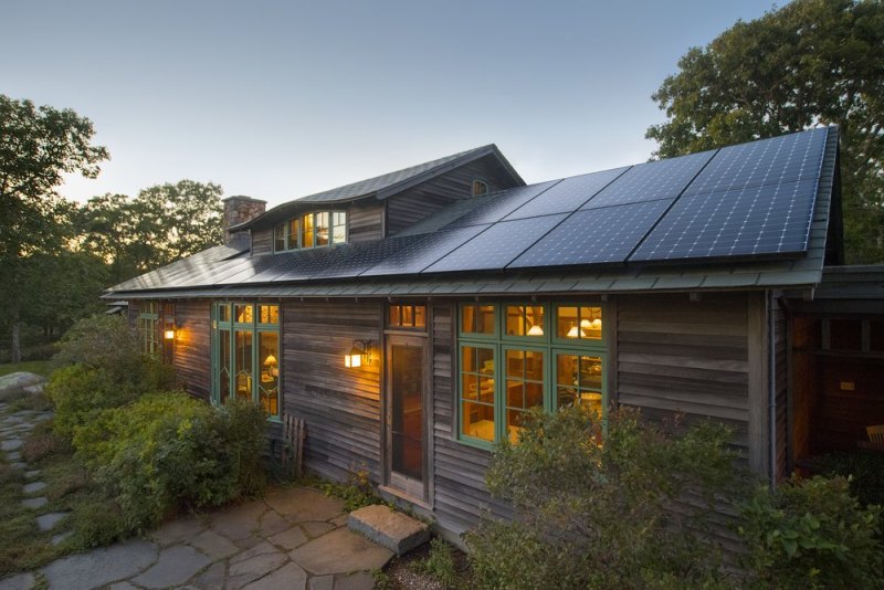 Home with Solar Panels at Dusk