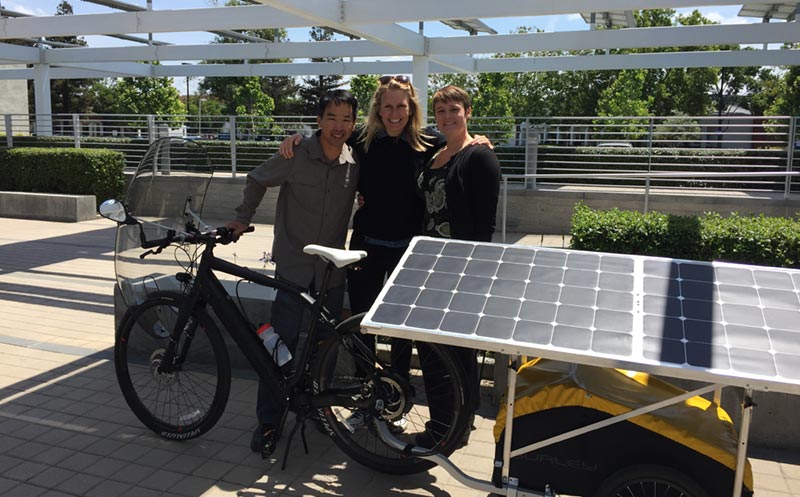 Marissa Muller and her solar bike with Kat and Kingsley from SunPower