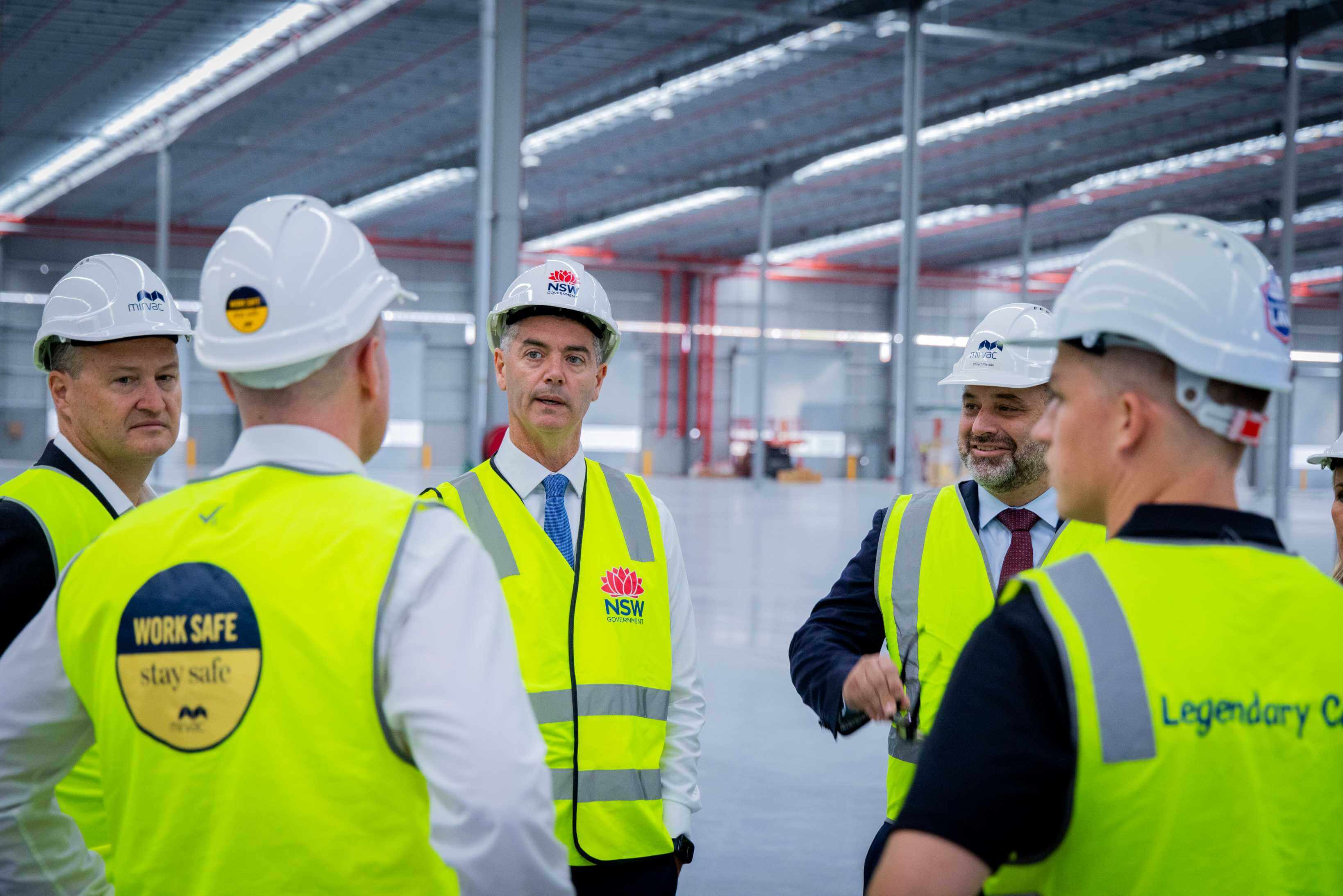 Blog > Back facing camera - Winning Group CFO, Brett Owers, Harry Boileau, General Manager, Winning Services talking to NSW Minister for Roads John Graham