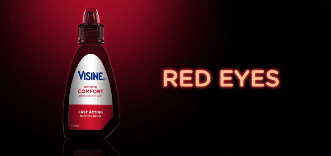 Visine Red Eye Comfort bottle with text 'Red Eyes' on a dark background, fast-acting redness relief