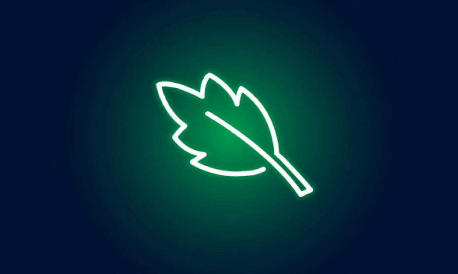 Green illuminated leaf icon on dark blue background