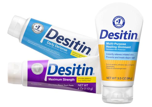 Three Desitin products are shown: Desitin Daily Defense, Desitin Maximum Strength, and Desitin Multi-Purpose Healing Ointment. Each product is in a tube with distinctive colors and labels, designed to treat and prevent diaper rash.