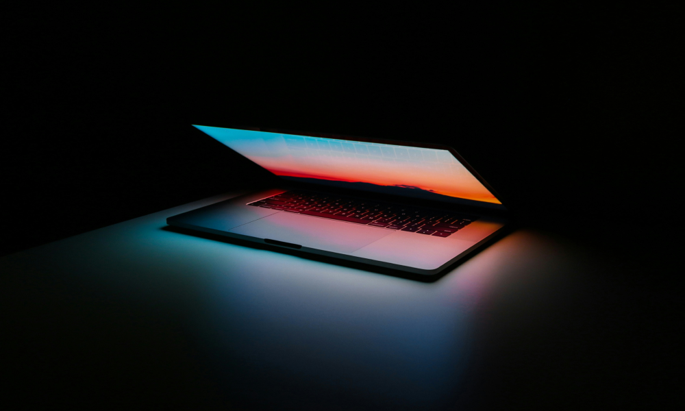 Computer in dark light 