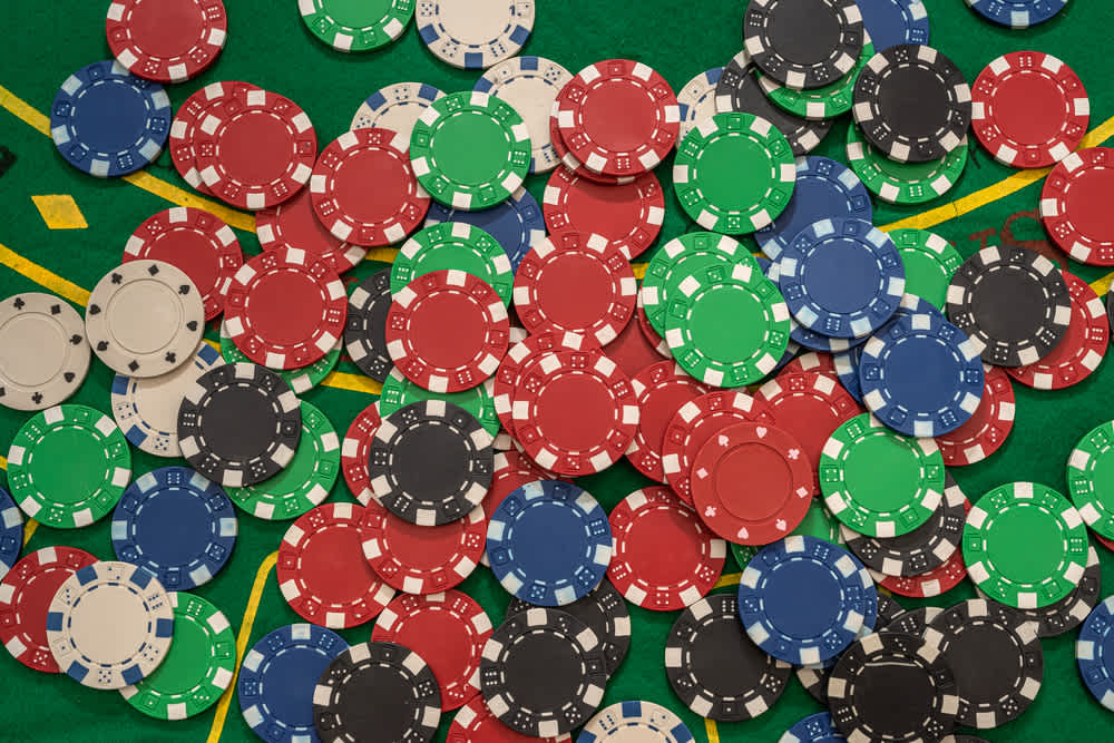 Poker chips on a poker table.