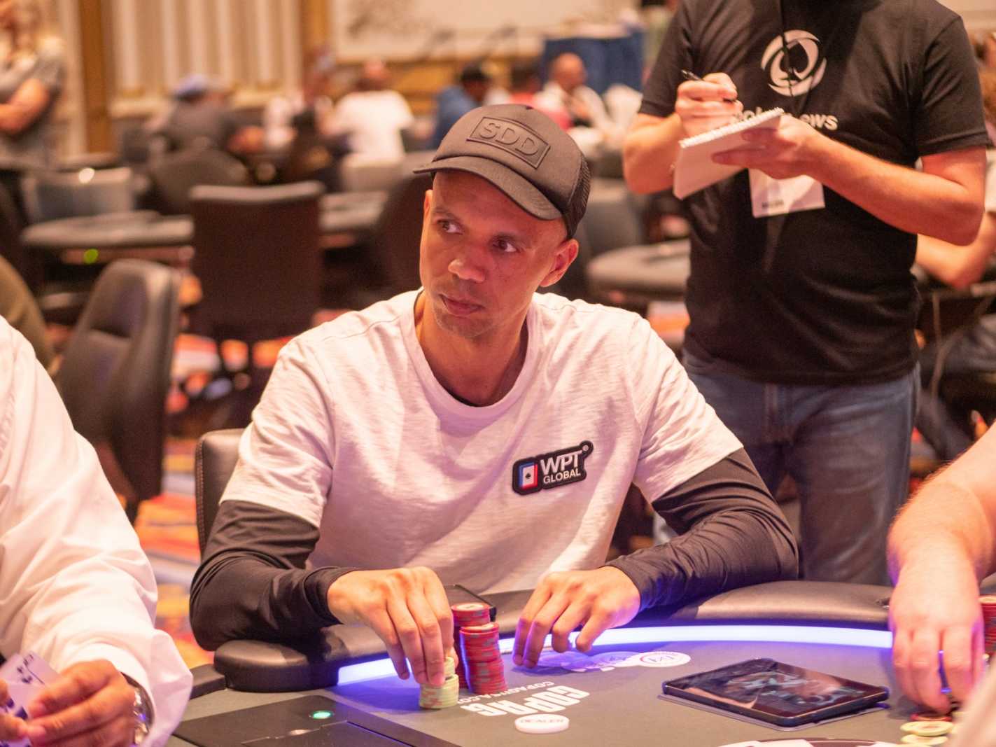 Phil Ivey stares down a rival player in a casino game of poker.