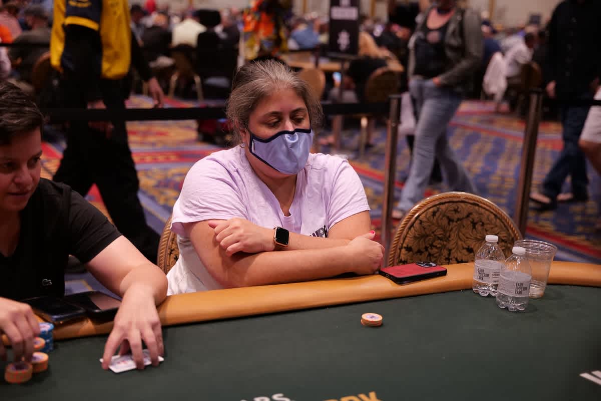 Poker player with a small stack of chips.