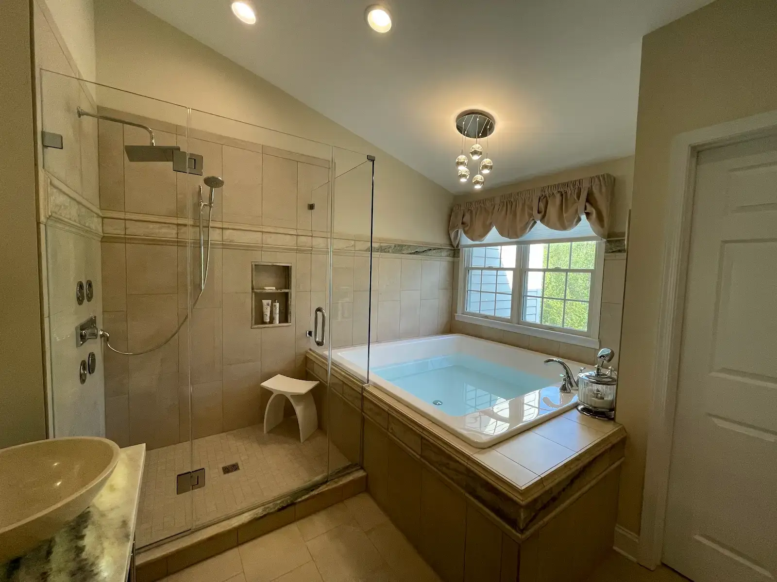 Denville NJ Bathroom 4 - Completed - 6 foot soaking tub with tile surround