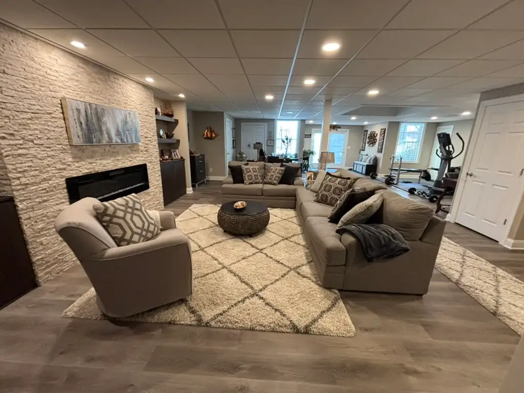 Denville NJ Basement 1 - Completed - Long view of the full new basement room Denville NJ Basement 1 - Completed - Long view of the full new basement room