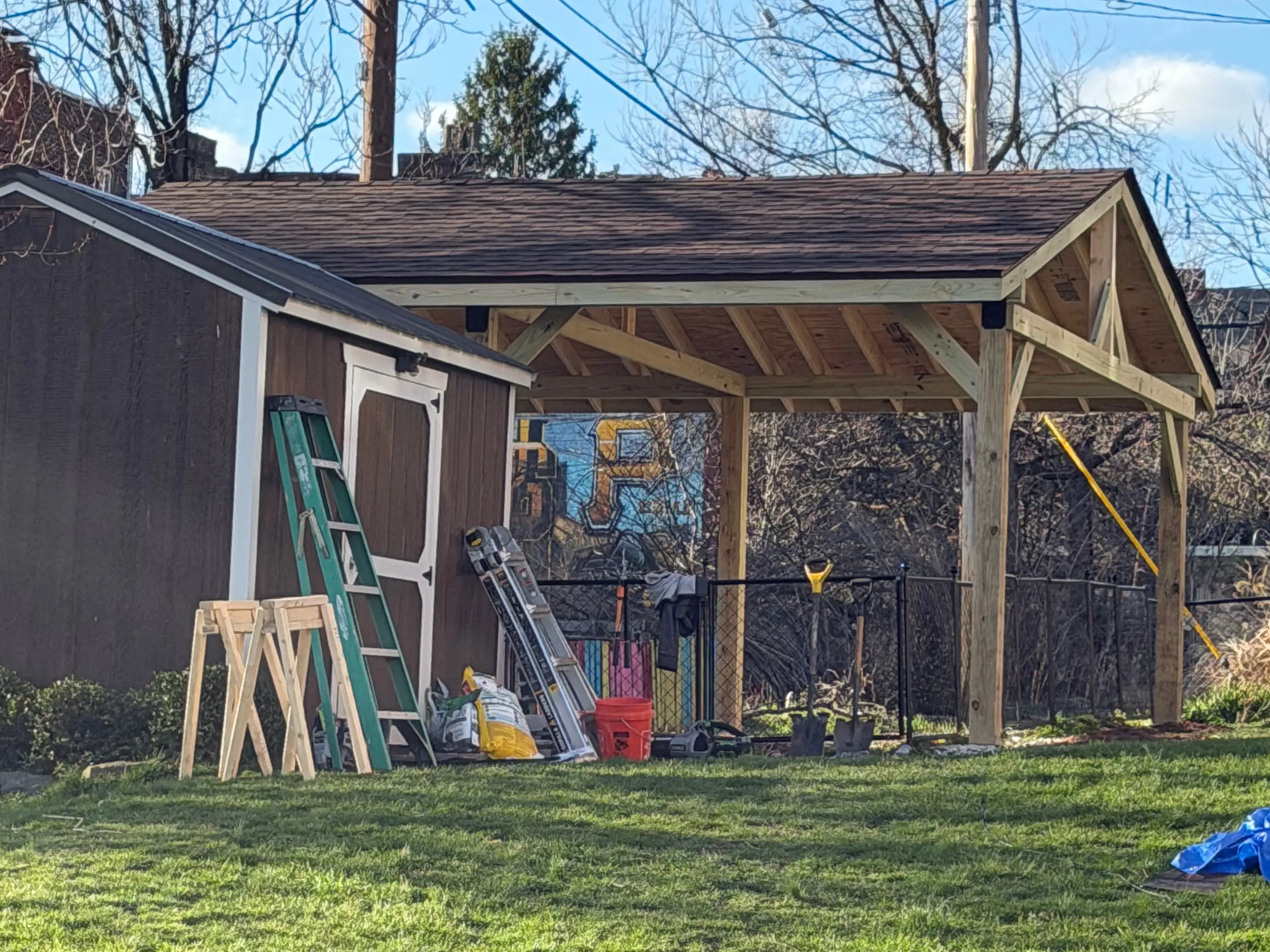 Close up of the car pavilion, including details of the roof structure. Close up of the car pavilion, including details of the roof structure.