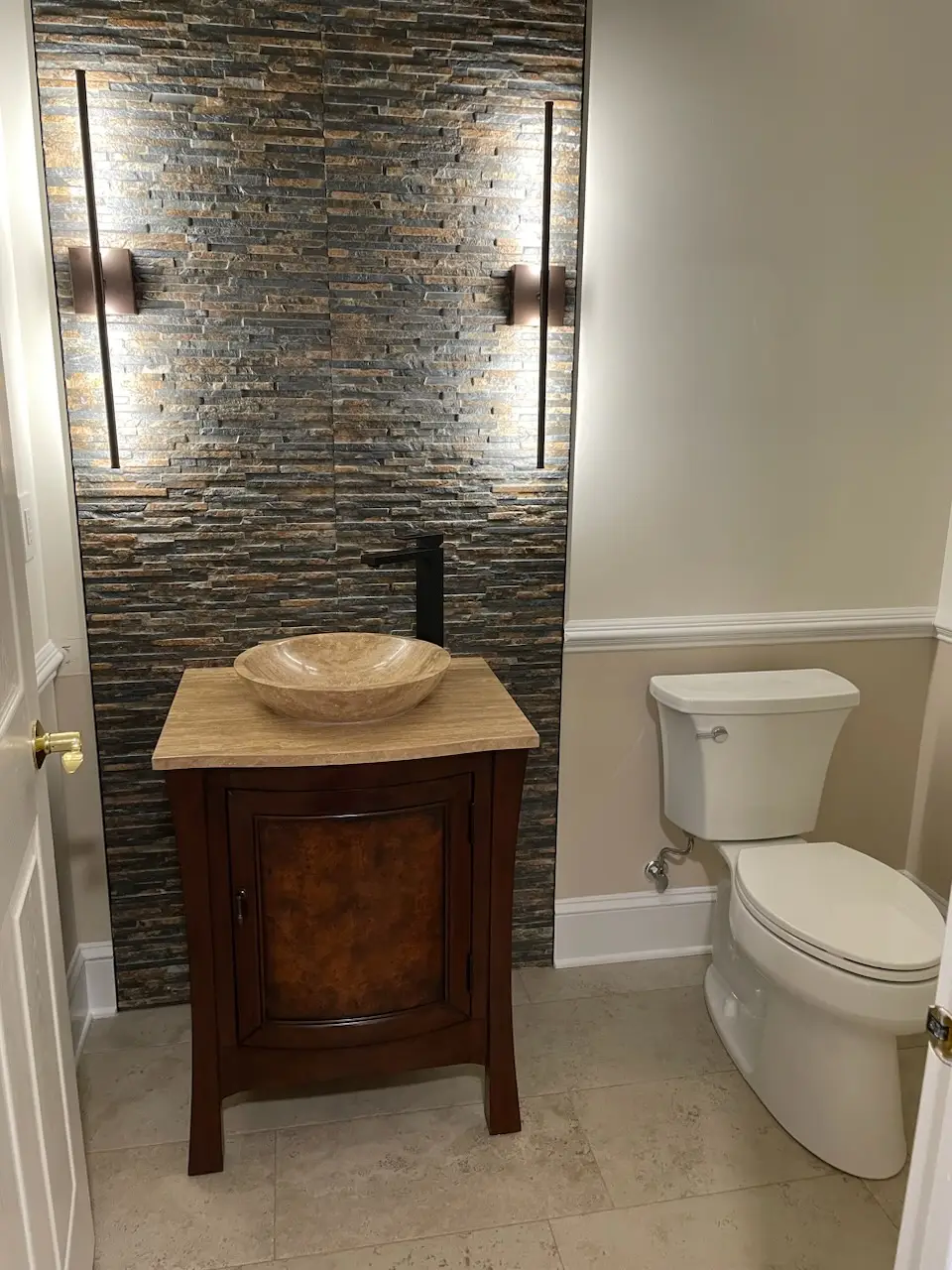 Denville NJ Bathroom 2 - Completed - Tile accent wall with stone bowl sink and stone countertop with accent wall lighting Denville NJ Bathroom 2 - Completed - Tile accent wall with stone bowl sink and stone countertop with accent wall lighting