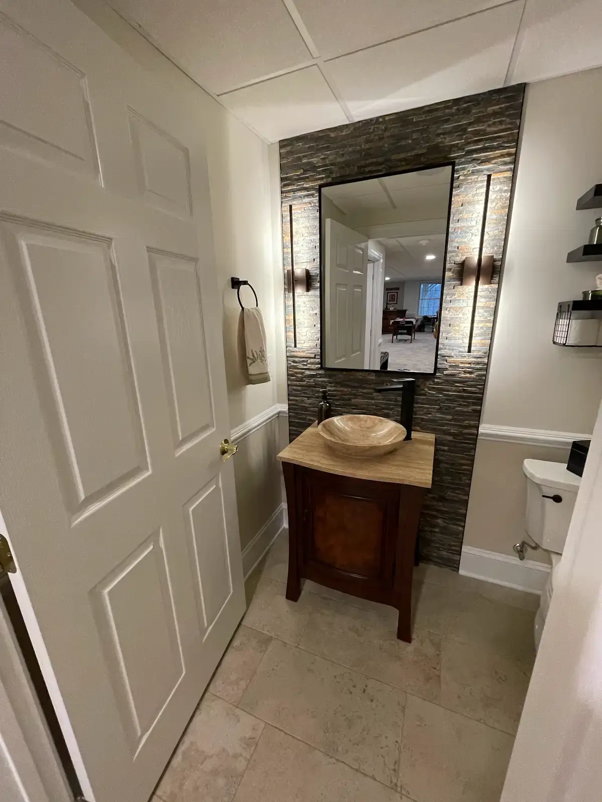Denville NJ Bathroom 2 - Completed - Tile accent wall with stone bowl sink and stone countertop with accent wall lighting Denville NJ Bathroom 2 - Completed - Tile accent wall with stone bowl sink and stone countertop with accent wall lighting