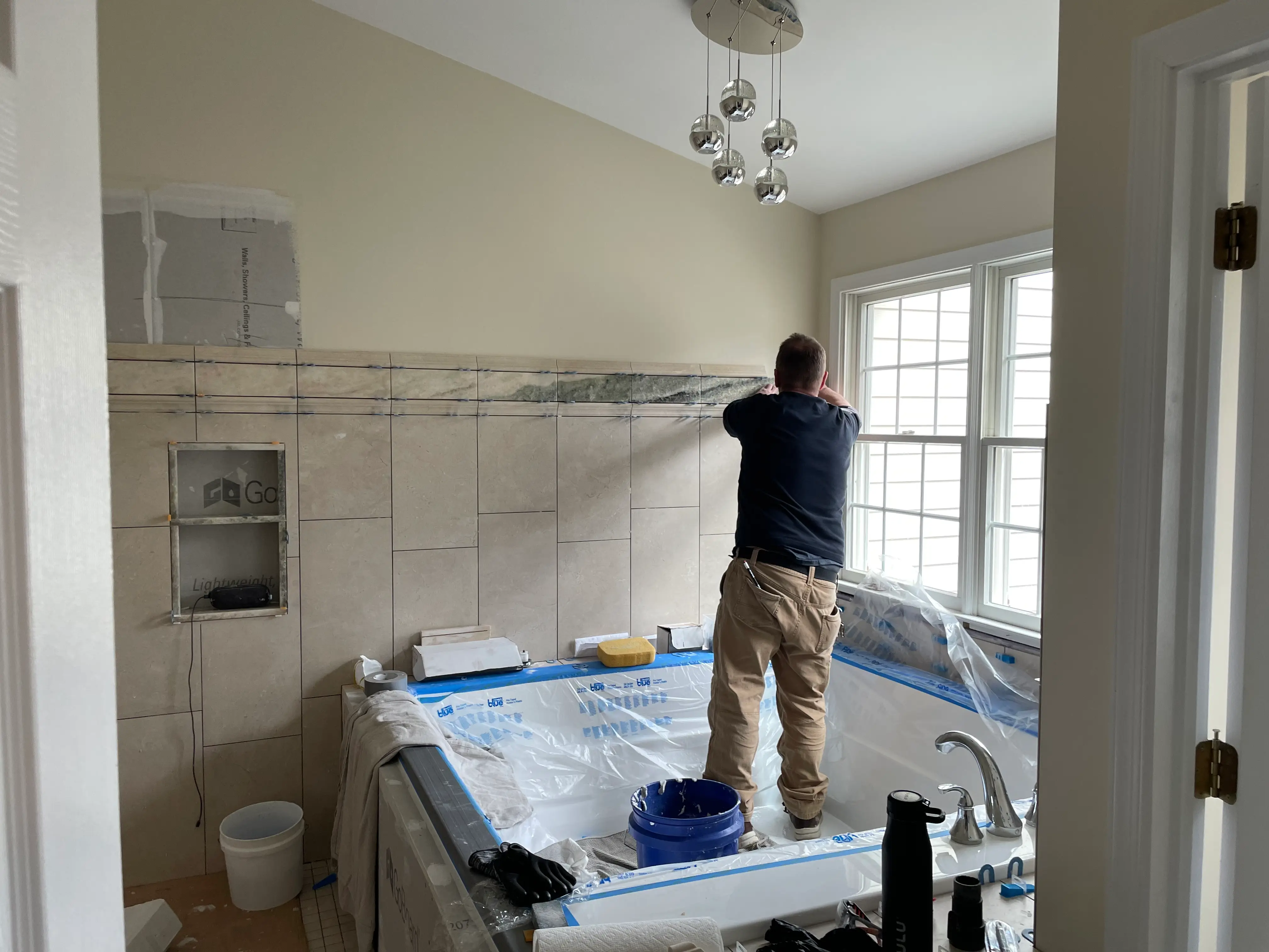 Denville NJ Bathroom 4 - In Progress - Installation of tile and stone detail Denville NJ Bathroom 4 - In Progress - Installation of tile and stone detail