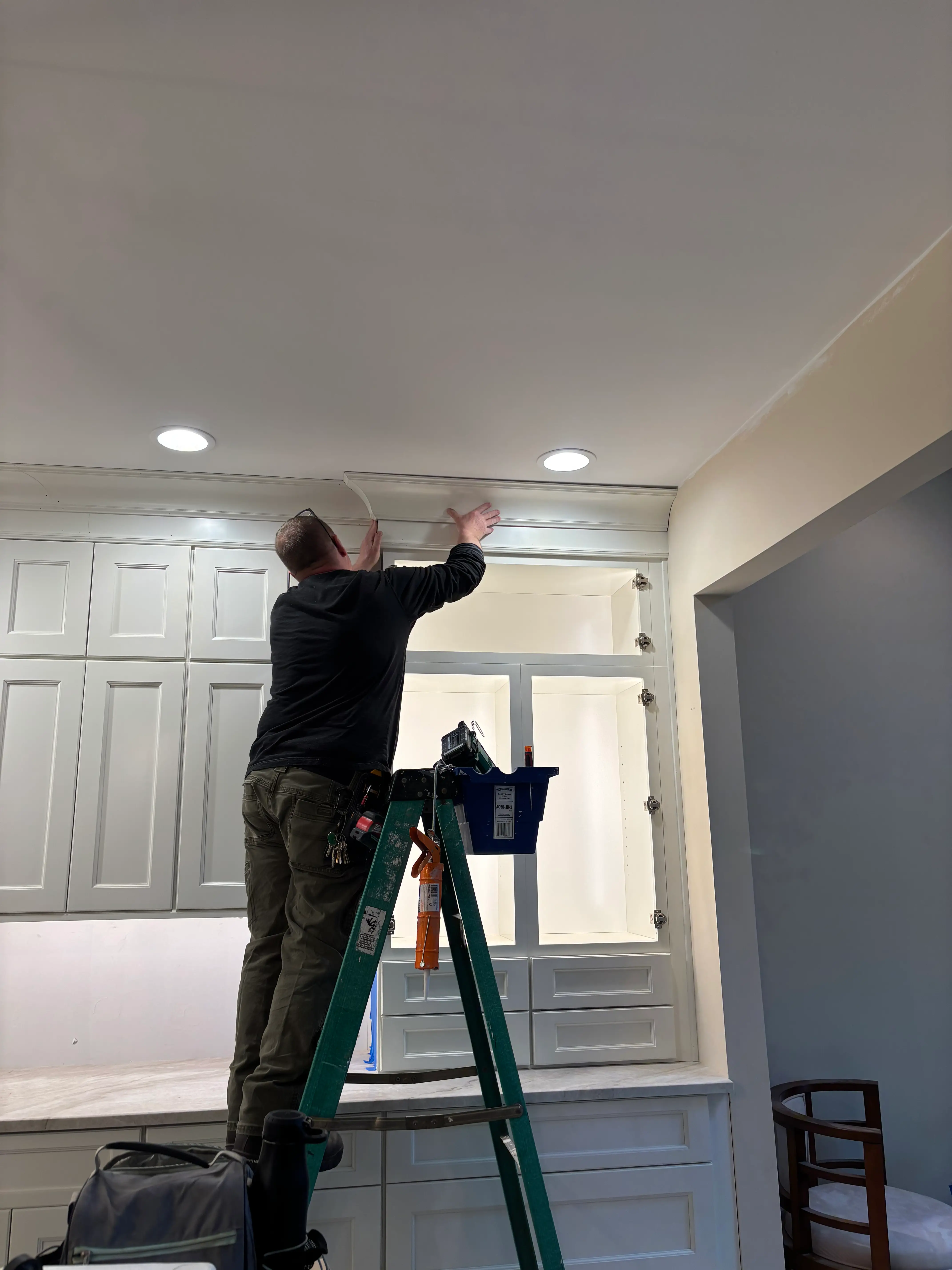 Denville NJ Kitchen - Finishing crown molding installation above cabinets, attention to detail Denville NJ Kitchen - Finishing crown molding installation above cabinets, attention to detail