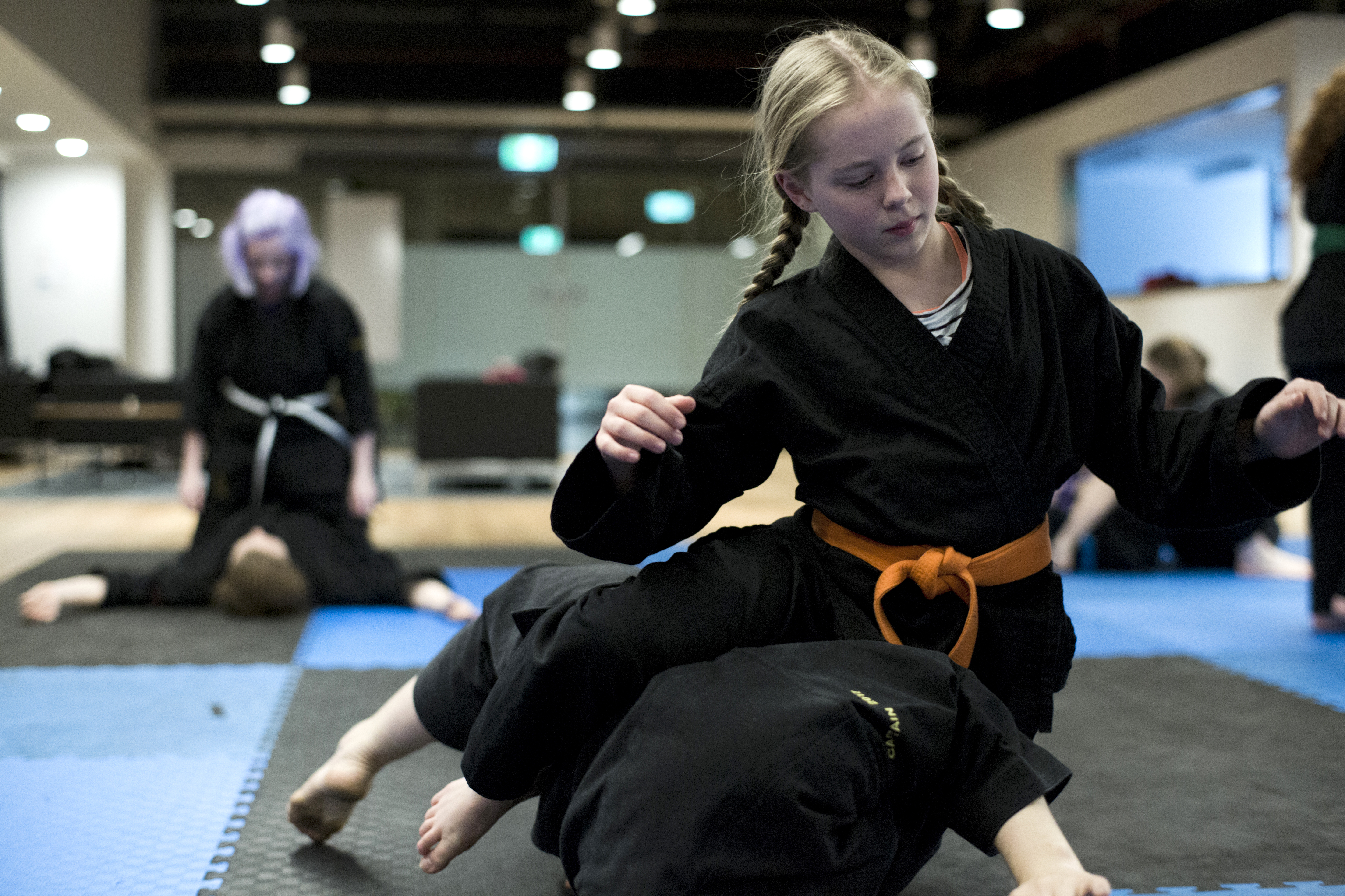 The girls practice their groundwork