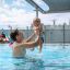 Man and child swim at Andrew Boy Charlton Pool