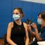 A young woman receives her Covid-19 vaccination at a pop-up clinic at Ultimo Community Centre.