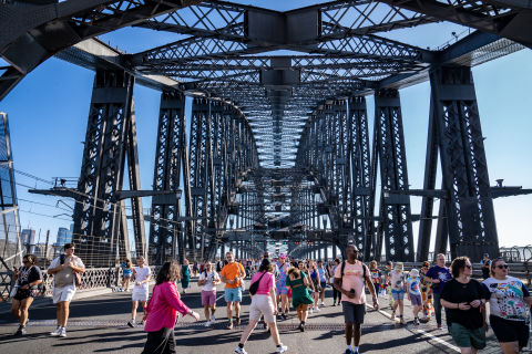 People walking across the Harbour Bridge in support of LGBTIQA+ people and rights. Image: City of Sydney / Abril Felman