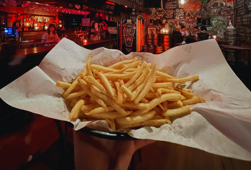 Sizing up the chips at burger joint Mary's. Image: City of Sydney / Abril Felman