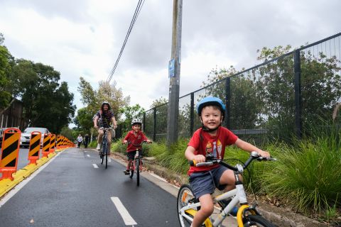 Matthew Perkins says he and his children have started riding to school more regularly since the pop-ups were built. Photo: Chris Southwood / City of Sydney