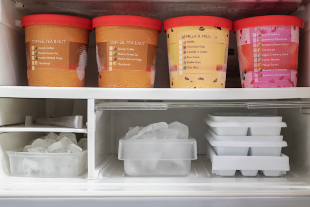 Freezer full of ice cream containers