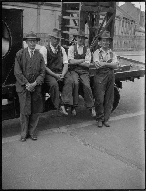 Bryant spent most of his working life employed by the railways, but he also spent a number of years wiring the lights of the Sydney Harbour Bridge. These four workmen were probably Sydney Harbour Bridge maintenance workers. Photo: Percy James Bryant / City of Sydney Archives A-01142143