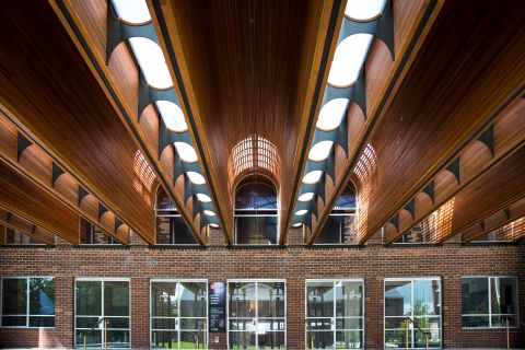 A refurbishment and conversion restored the 1936 heritage building. Brickwork and timbers were restored, arched rooves redefined and a mix of brass, copper and glass integrated.