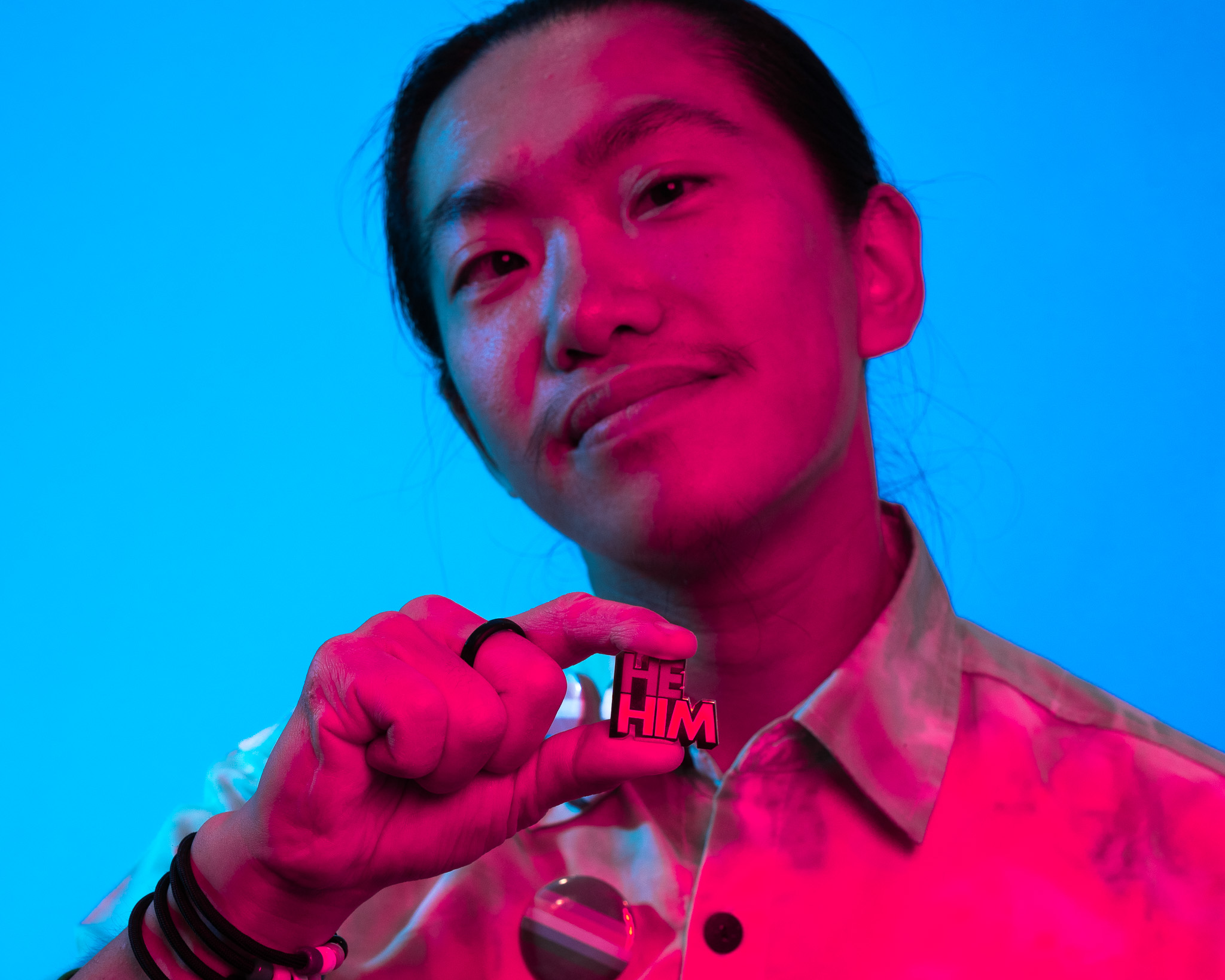 Kerry Chin (he/him) with a badge showing his pronouns. (Photo by Abril Felman/City of Sydney)