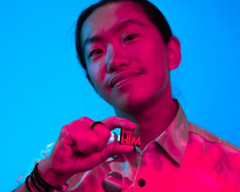 Kerry Chin (he/him) with a badge showing his pronouns. (Photo by Abril Felman/City of Sydney)