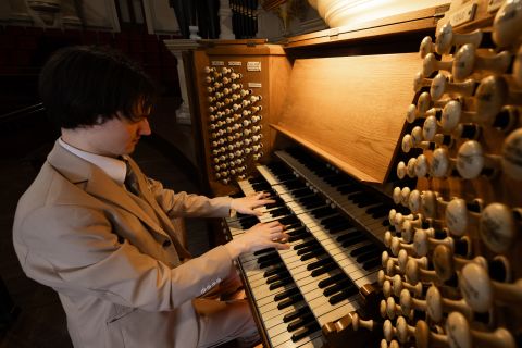 Titus plays the organ. 126 speaking stops, nearly 9,000 pipes and a unique 64 foot pedal stop. Image: Abril Felman, City of Sydney