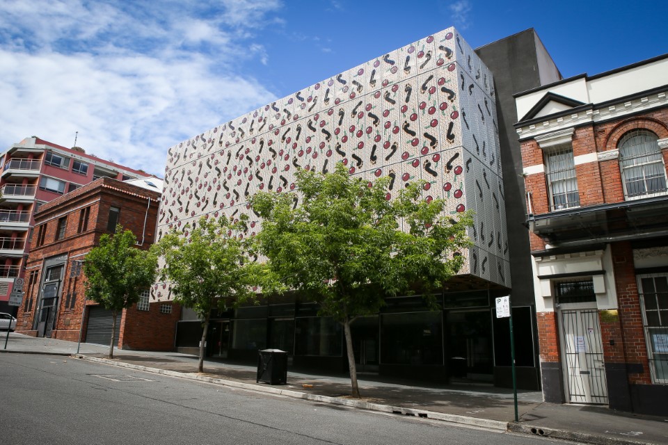 New Koori Radio building and Gadigal Information Services offices on Cope St, Redfern. Artwork: Cherry Pickers by Blak Douglas