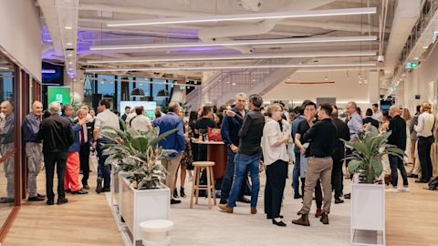 Guests mingle after formalities at the Greenhouse Climate Tech Hub launch event