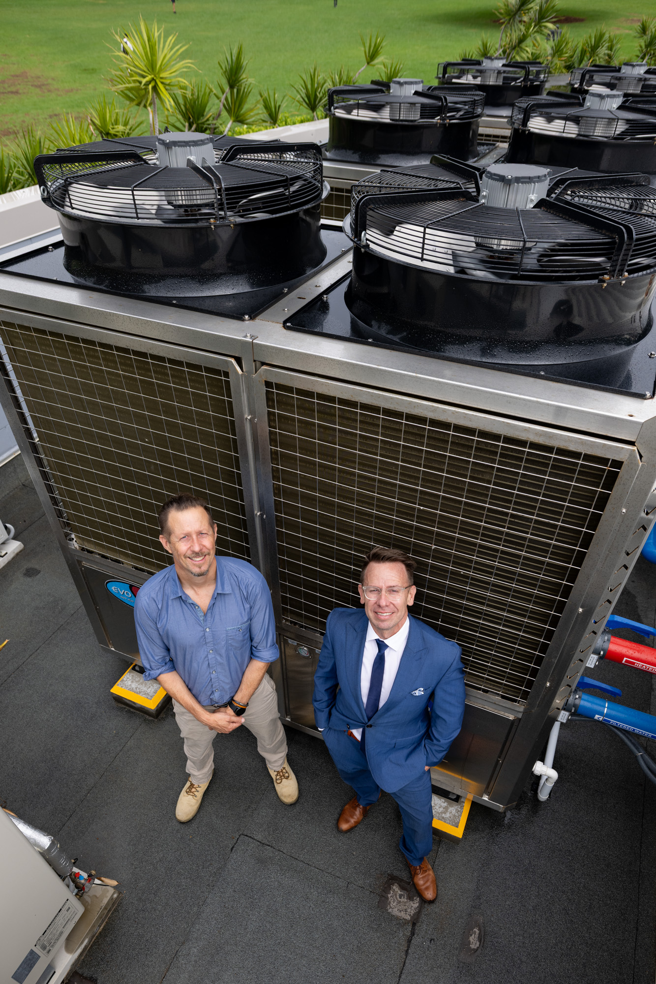 Jody Whiteoak and Rod Kington with the heat pumps. Image: Chris Southwood / City of Sydney