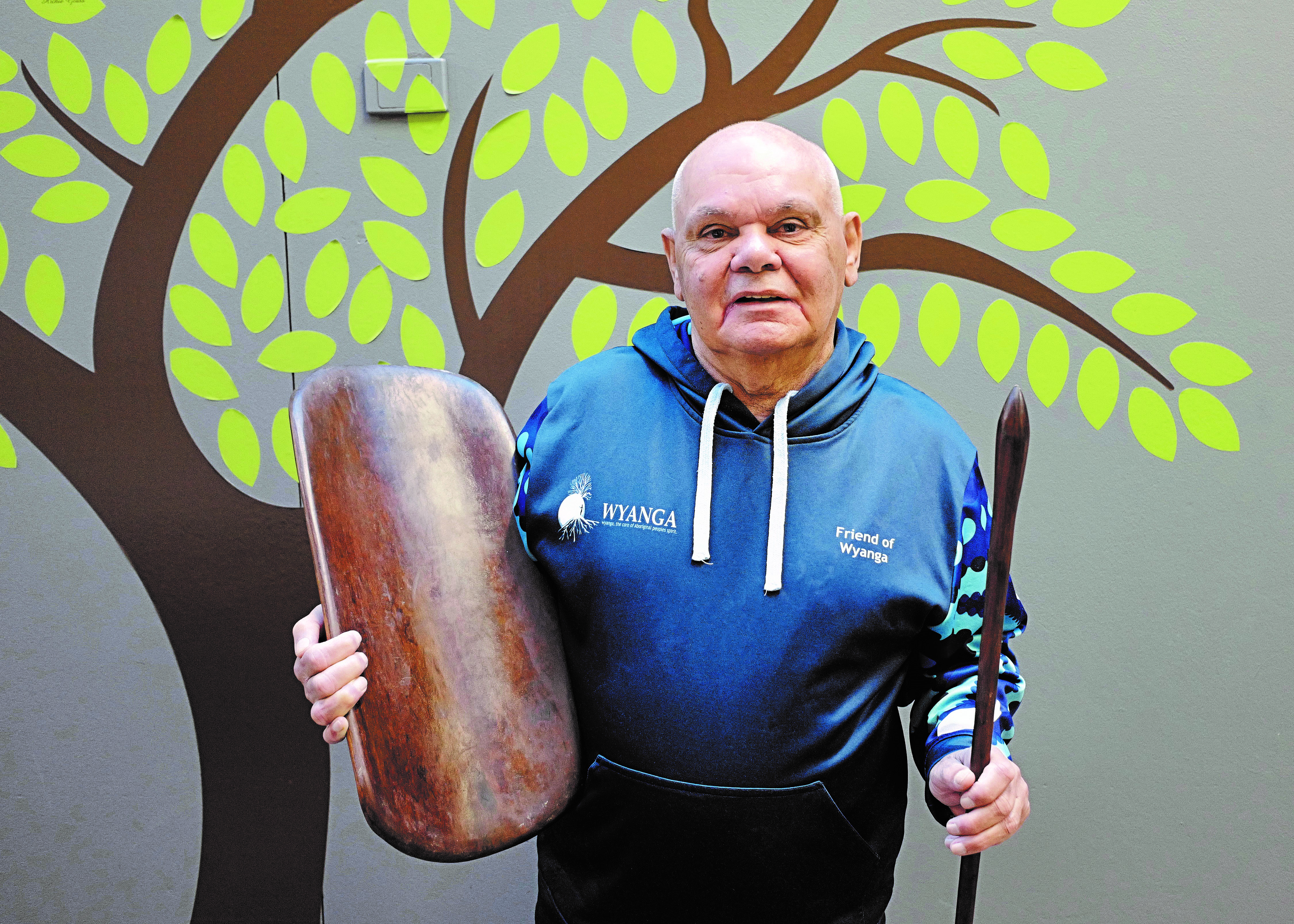 Elvis at Wyanga with handcrafted coolamon and bundi stick. Photo by Vicky Haines.