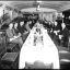 A group of men around a long lavishly set dining table, unknown location, no date. City of Sydney Archives. A-01153307