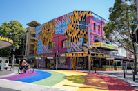 Painted mural on Kinsela's designed by Double Rainbouu’s Mikey Nolan for Sydney WorldPride.