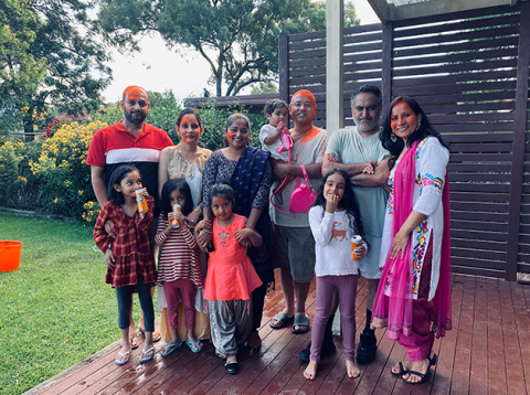 Paramjit and her family celebrating Holi