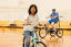 2 people on bikes at the Activate Inclusion Sports Day at Perry Park Recreation Centre