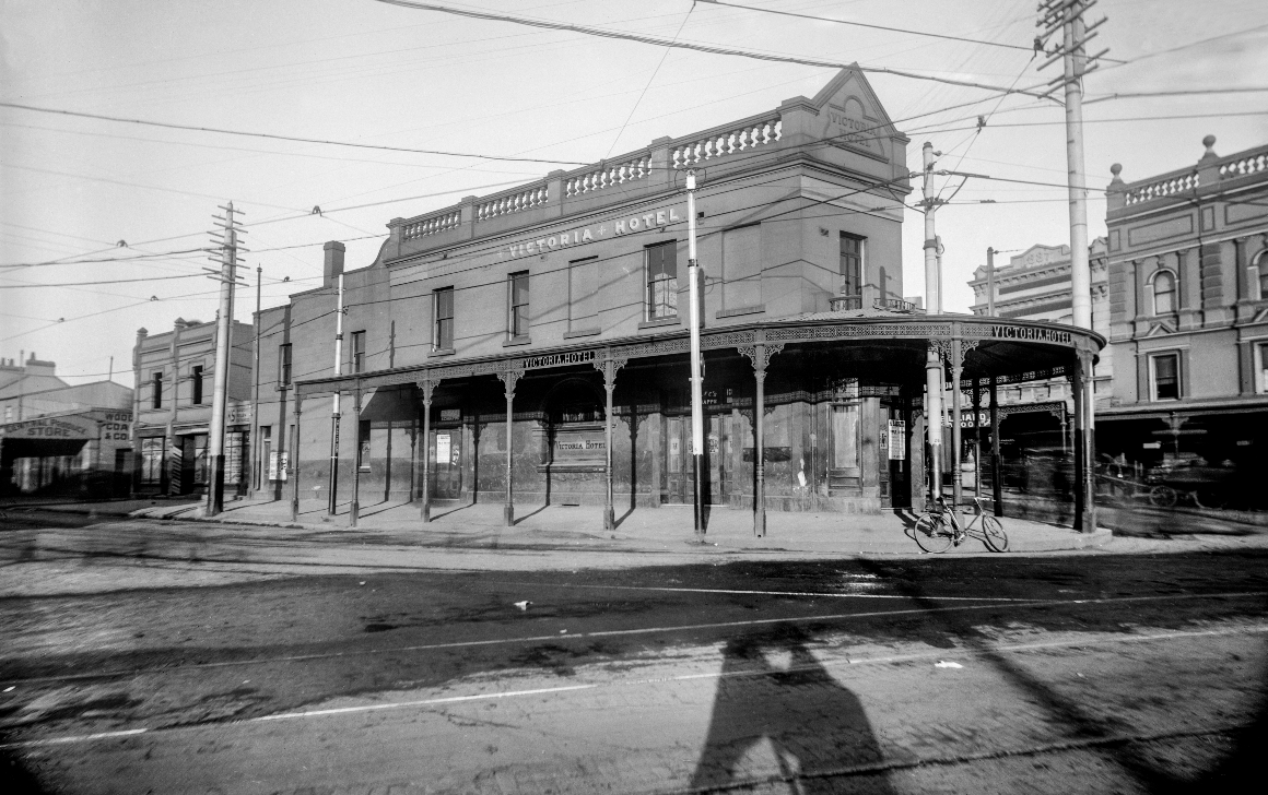 Here is the photographer, his shadow caught in the act, capturing the Victoria Inn on the busy intersection of Flinders, Bourke and Oxford streets in July 1907. City of Sydney Archives, A-01000284