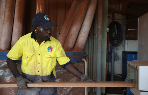 Wood sourced from Arnhem Land mining scrap is used to make the arms of chairs and sofas by local Indigenous workers.
