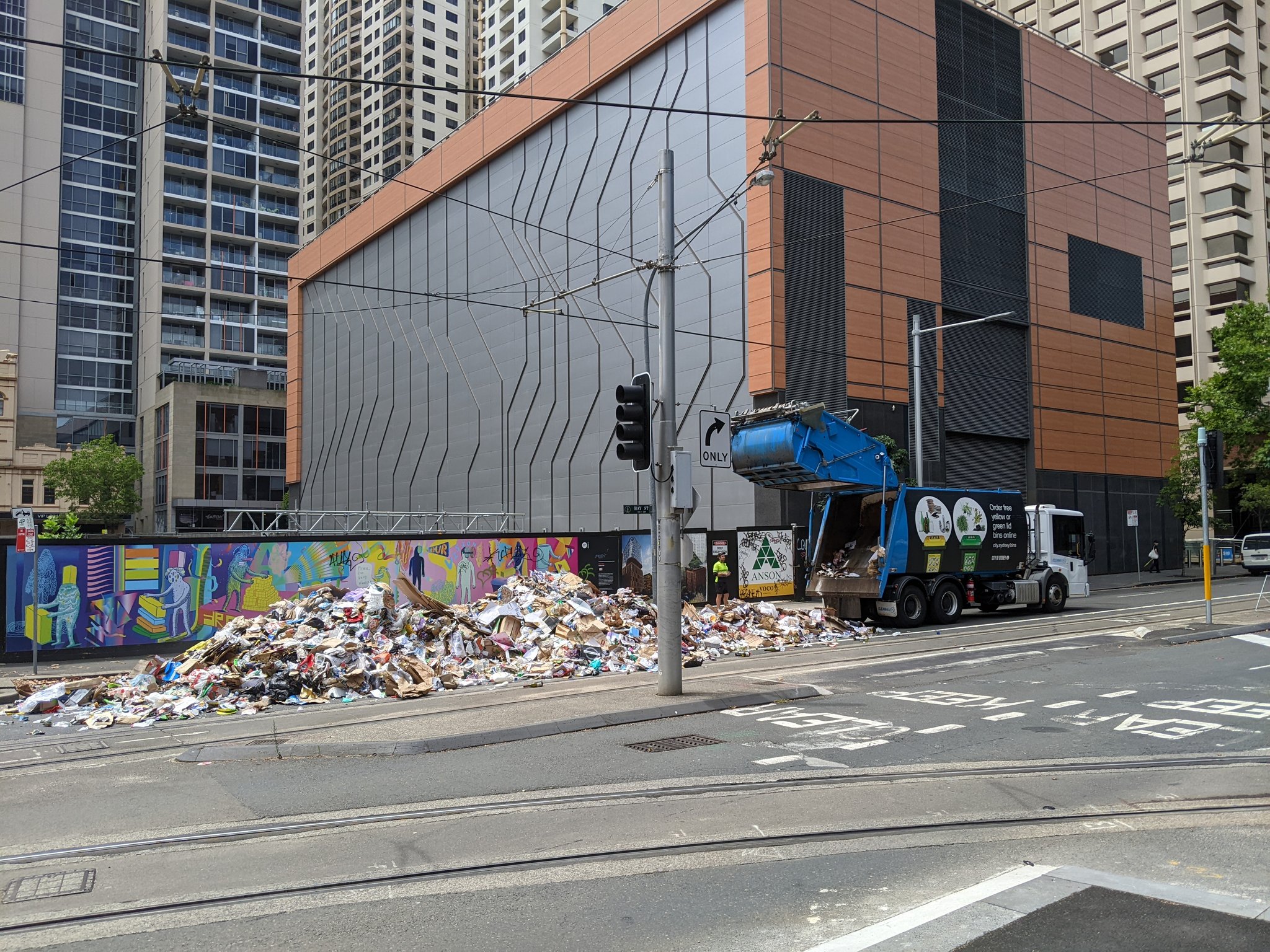 The truck's crew were forced to dump the contents of the compactor after smoke was spotted. Photo: Nic Cook