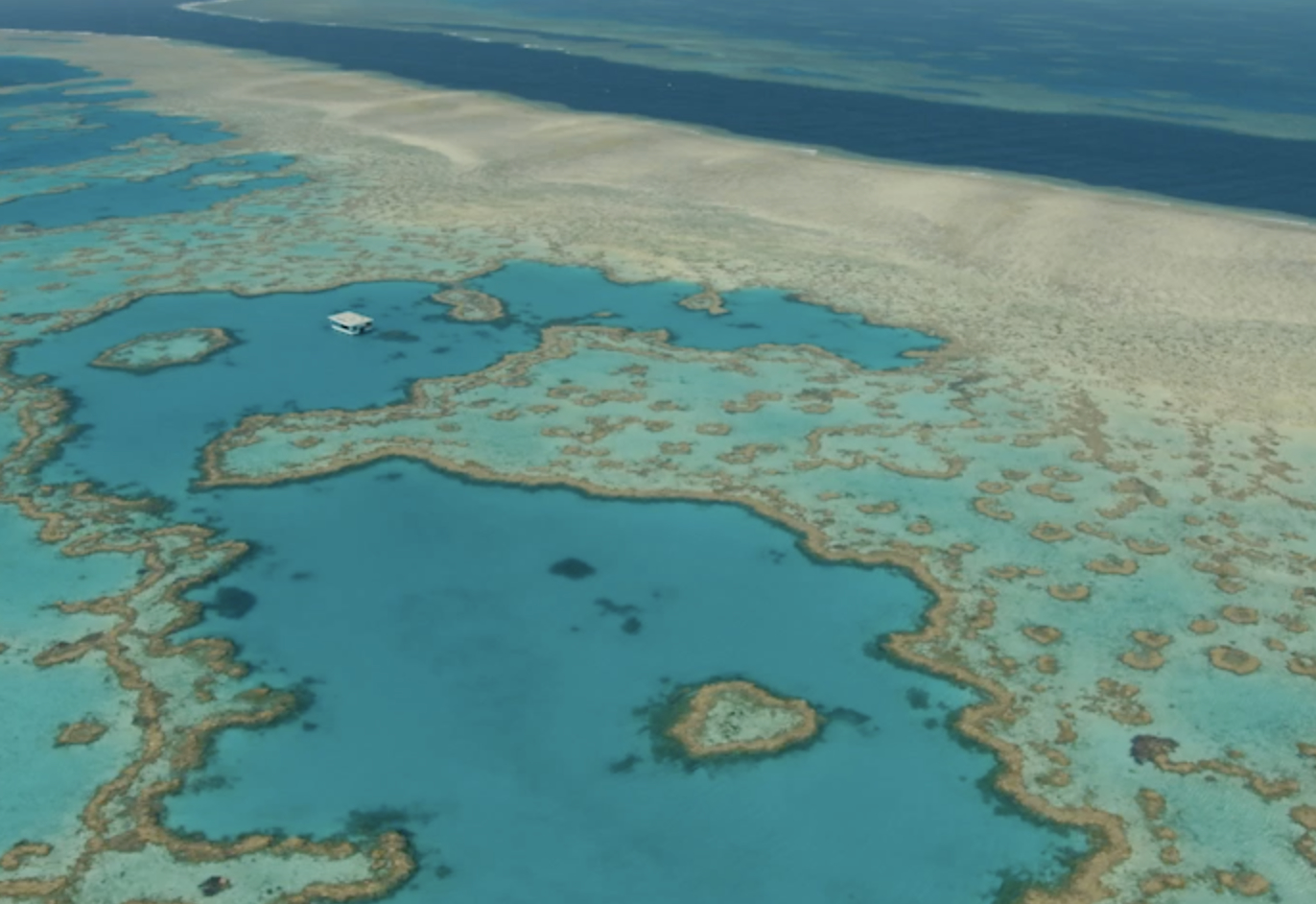 Great Barrier Reef aerial view at sunrise Australia