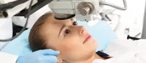 Patient undergoing ophthalmology vision correction treatment.