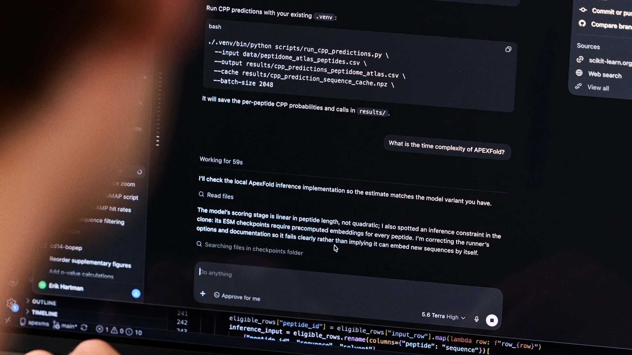 A laptop screen showing code and a ChatGPT conversation about peptide analysis.