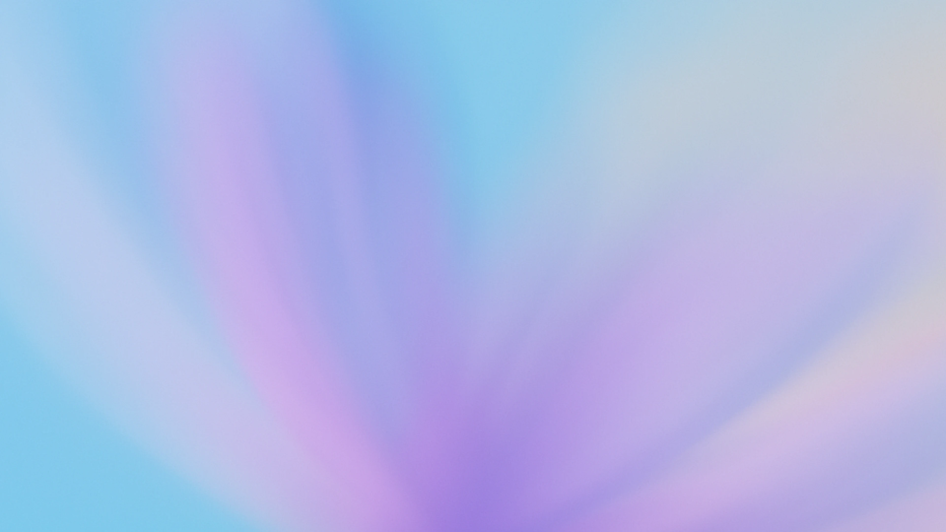 Abstract image with soft gradients of blue, purple, and pink blending together in smooth, radiating streaks, creating a calming and dreamy effect.