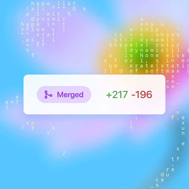 Abstract blue gradient background with scattered white code snippets; centered white rounded box shows a purple merge-icon label reading ‘Merged’ next to green ‘+217’ and red ‘-196’ line-change counts.