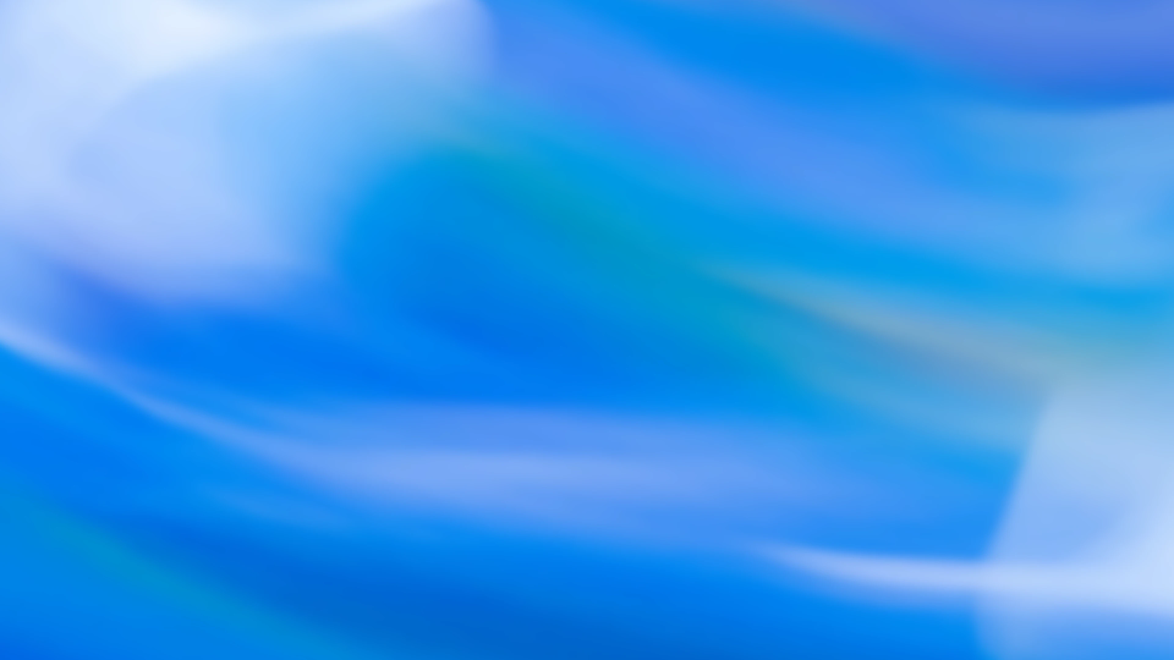Abstract image with swirling gradients of blue, teal, and soft white, evoking a sense of movement and calm, like flowing water or sky.