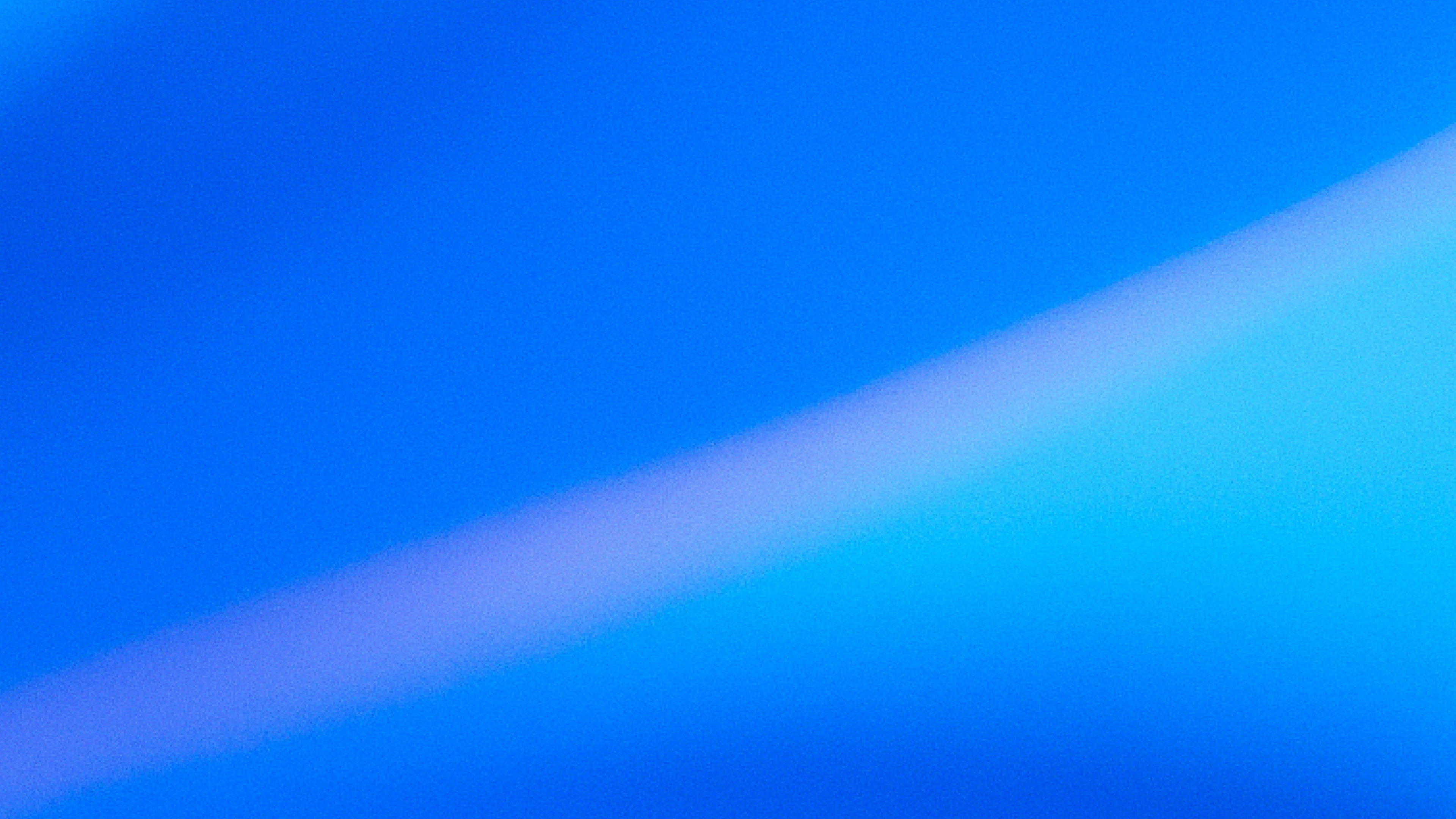 Abstract gradient of deep and light blue with a diagonal sweep of soft purple, evoking trust, security, and forward motion.